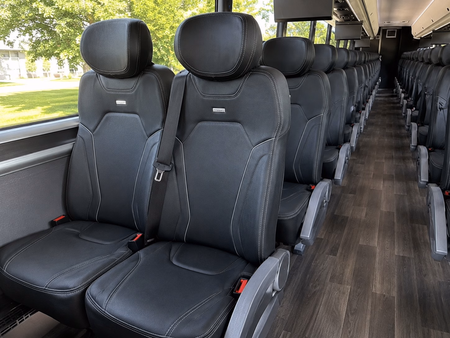 how seasonality and peak times affect charter bus rates in dearborn michigan